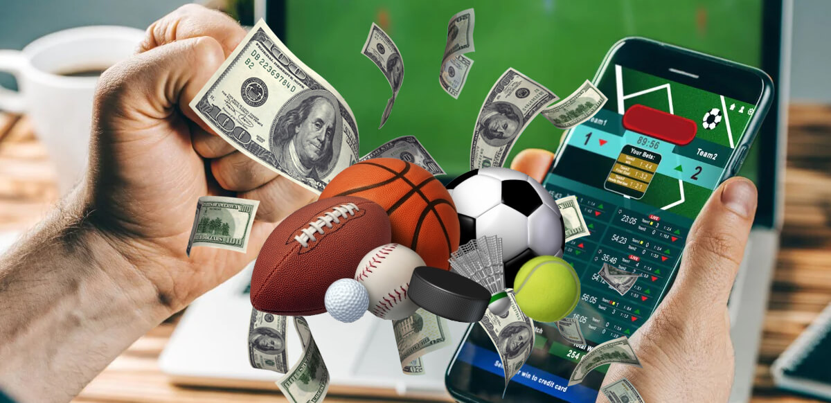 Person-Betting-on-Mobile-Phone-Different-Sports-Balls-Money